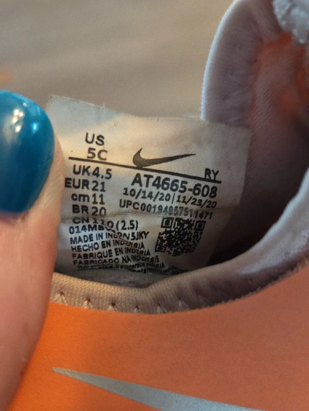 Nike Kids Orange Slip-On Sneakers with Grey Swoosh